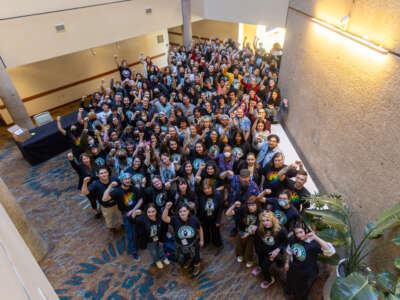 Starbucks Workers United members pose for a photo.