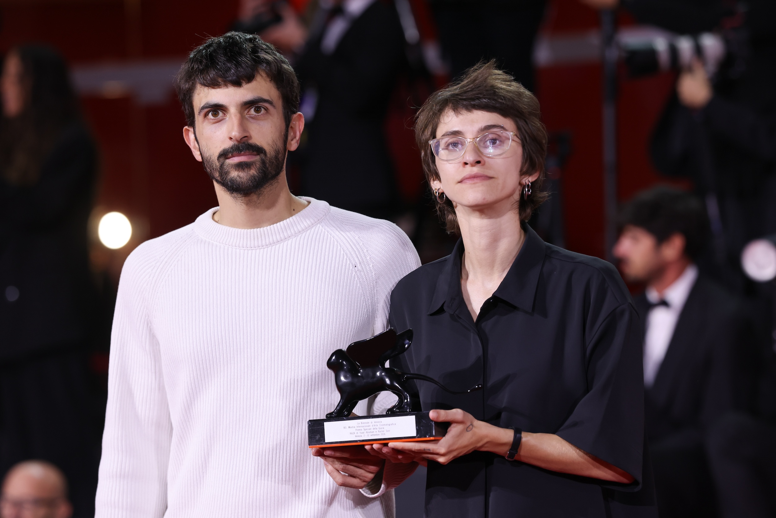 Photo: truthout.org Yuval Abraham and Rachel Szor pose with the Special Jury Prize Award for "NAZA" during the 83rd Venice International Film