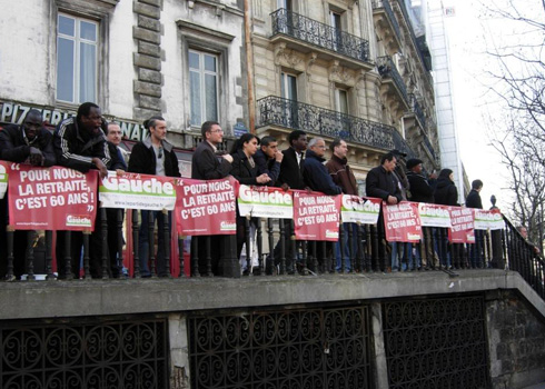 French university professors under the banner of Sauvons l'université (let's save the university).