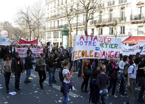 Student teachers. The banner says, 