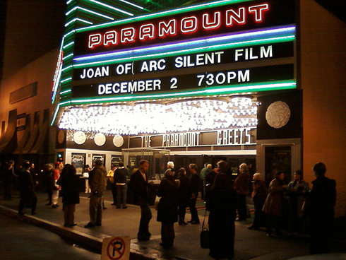 A fully-restored Paramount theatre welcomes guest for an evening out on Broadway Street.