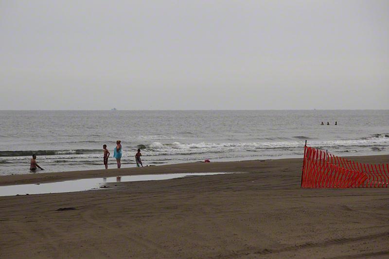 Families on beach in Grand Isle, Louisiana.