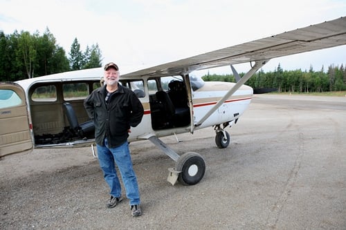 Mark Bledsoe is our pilot. Tall, frosty beard, baseball cap, jeans and a belt.
