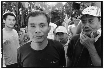 Carmen, Mindanao, Philippines - Felix Bacalso is a striker at the Diamond Farms banana  plantation. Strikers were expelled by Dole Co. guards, despite the fact that, as a result of land reform, the  strikers supposedly own  the plantation. Bacalso has ten children, some of whom live with other families since  he  can't support them on what Dole pays for bananas.