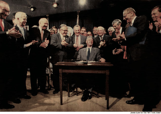 Signing the Financial Services Modernization Act