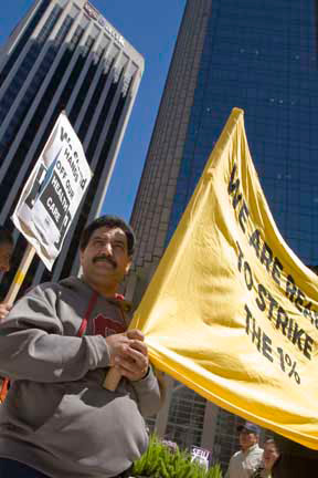 Man with Yellow Banner.