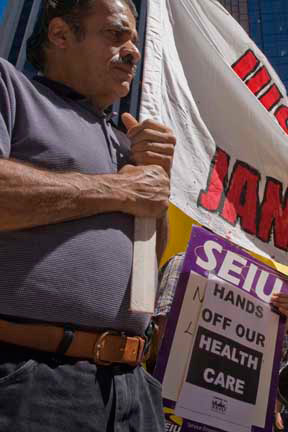 Man with White Banner.