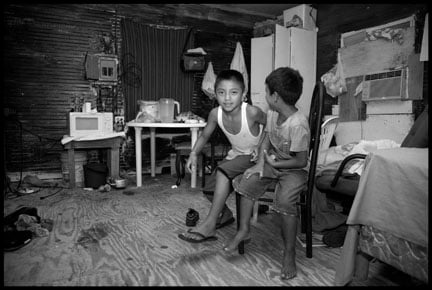 Families, including children, live in the Strickland labor camp. Many come from Mexico, mostly Veracruz, and work in the fields of tobacco and sweet potatoes.