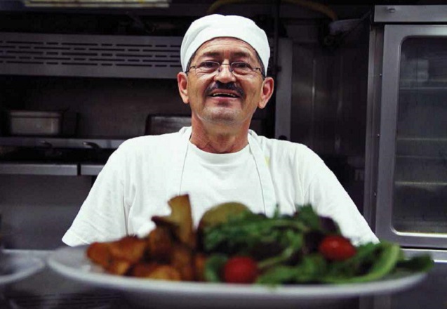 The head chef at a restaurant in Hollywood. This photo was part of the Restaurant Opportunities Center’s (ROC) photo exhibit, “107 Stories: Through Restaurant Workers’ Eyes.” With over 8,000 members, ROC is leading the growing movement for fair wages and rights for restaurant workers throughout the country. (Photo: © Kellee Matsushita, Brave New Seed Photography)