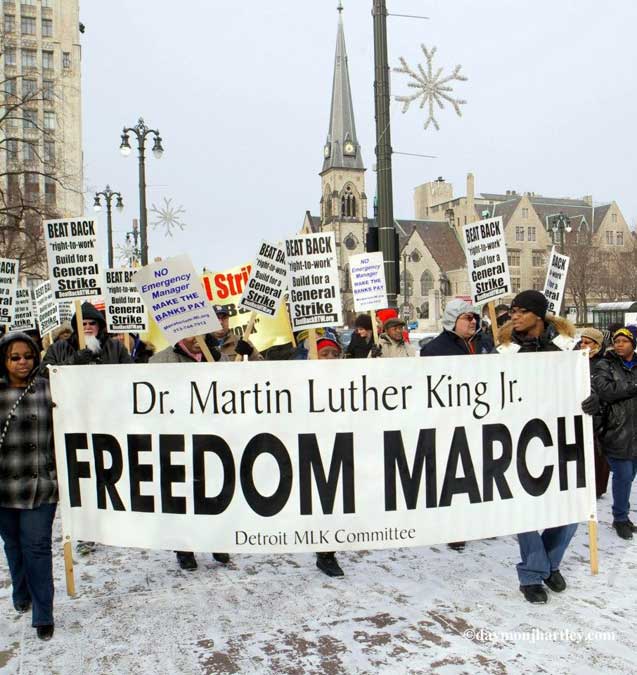 Several hundred folks begin a march to downtown Detroit in honor of MLK.