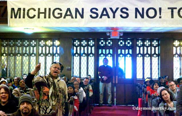 ULongtime activist Maureen Taylor, state chair of Michigan Welfare Rights, reacts to a speech. 