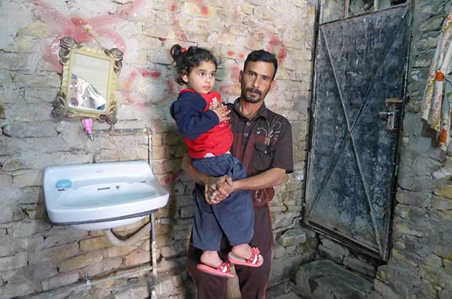 Hundreds of families, like those of Dahfer Hamid's, are living in areas of Baghdad that most would consider unliveable, due to having fled sectarian violence in 2006-2007. (Photo: Dahr Jamail / Al Jazeera)