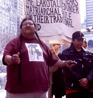 Canupa Gluha Mani, founder of the Strong Heart Warriors Society, speakers before marching to the United Nations, April 9, 2013. (Photo: Victoria Law)