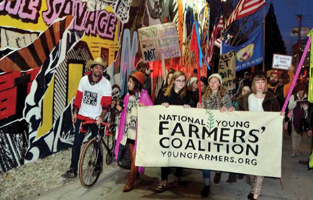 The National Young Farmers' Coalition, marching here with Occupy Wall Street, connects new farmers to share skills and fight for national policies that will 