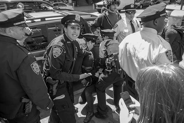 A seemingly unprompted arrest occurs on 14th Street near 1st Ave, during an anticapitalist march. (Photo: Craig O'Connor)