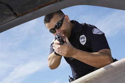 (Image: <a https://www.shutterstock.com/cat.mhtml?page_number=1&position=0&safesearch=1&search_language=en&search_source=pic_recommended&search_type=keyword_search&searchterm=police%20shooting&sort_method=popular&sort_version=4_0&source=search&timestamp=1379424826&tracking_id=6da6HZN0aO0PbC-HHu6oqg&version=llv1&page=1#id=120803200&src=6da6HZN0aO0PbC-HHu6oqg-1-0