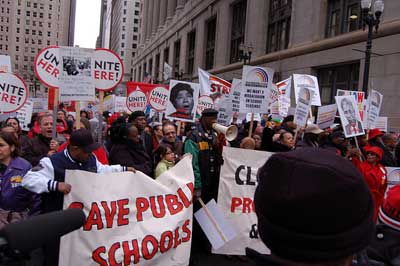 Protesters demonstrate against school closures in Chicago, March 27, 2013.