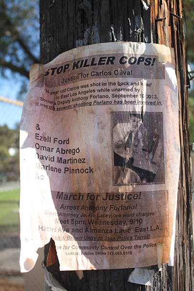 A flyer bringing attention to the march held one year on from when Carlos Oliva-Sola's was killed by two LA sheriff deputies. (Photo: Daniel Ross)