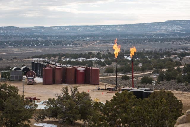 Flares burning at fracking industry site on federal land near Counselor, New Mexico. (Photo: ©2015 Julie Dermansky)