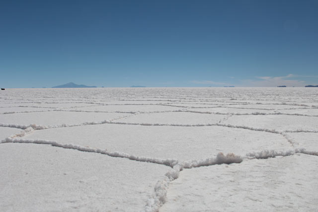 At 3,700m the other-wordly salt desert of Salar de Iyuni glistens in the high altitude sun. Here, with minimal road, rail or air connections, is where the lithium deposits that Evo Morales wants to develop are located. (Photo: Chris Williams)