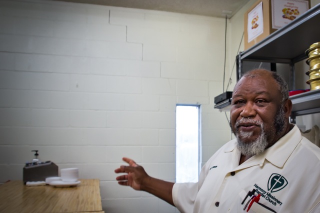 Pastor Frank Douglas Lawson Sr. points out a crack in the wall of his church that opened after the fracking started. (Photo: ©2015 Julie Dermansky)