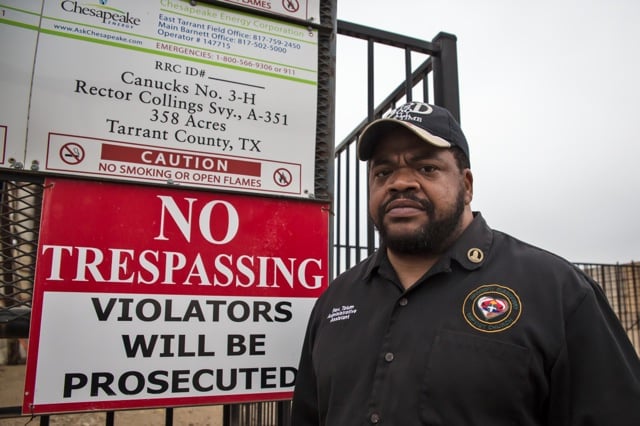 Pastor KyevTatum, an anti fracking and civil rights activist next to a fracking site in Fort Worth Texas. (Photo: ©2015 Julie Dermansky)