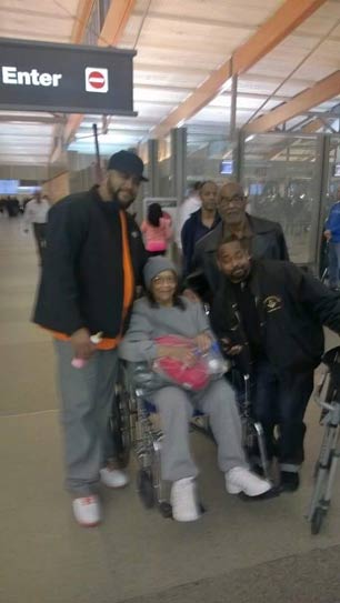 Greg Walker, Phyllis Hardy, Willy Hardy (her husband) and Yuma Hardy shortly after her arrival at the Raleigh-Durham airport. (Photo: Anaya Walker, age 9)