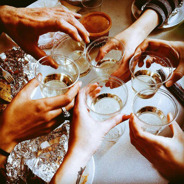 Chicago organizers raising a glass to the struggle, and to the day’s progress. (Photo: Brit Schulte)