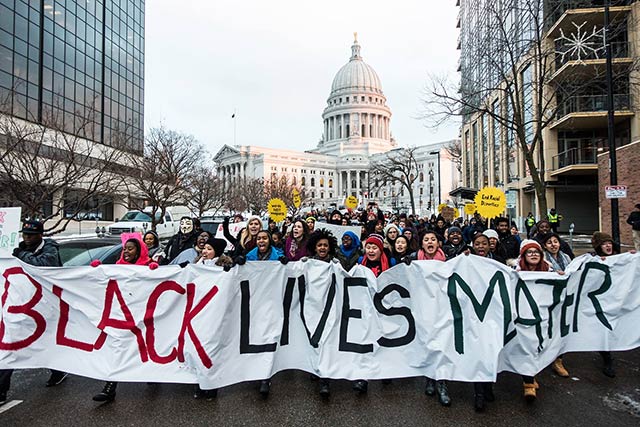 First YGB rally the day after Darren Wilson's non-indictment, marching from the Jail to testify at the County Board Hearing on jail funding. (Photo: Nate Royko Maurer)