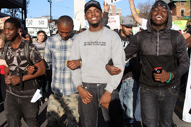 Residents march during a #BlackLivesMatter protest on May 1, 2015, in Ann Arbor to call for an independent investigation into Aura Rosser’s death. (Photo credit: Eduardo García)