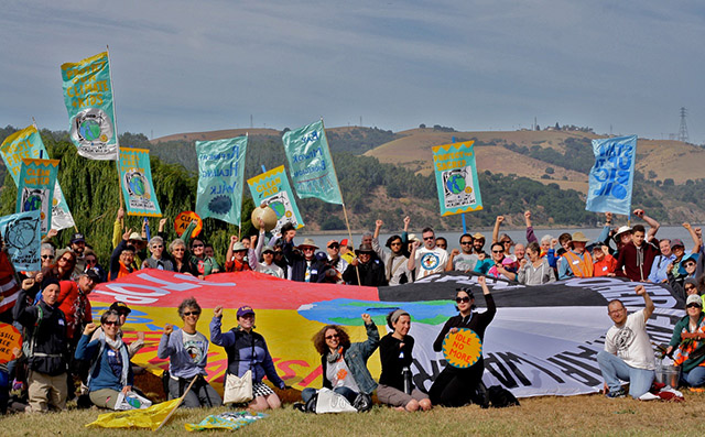 Community members, activists, artists, faith leaders and other Bay Area residents gathered around to commit to building a future that transitioned away from dirty crude to one, where access to healthy jobs and clean environment was not a privilege for a chosen few. (Photo: Rucha Chitnis)