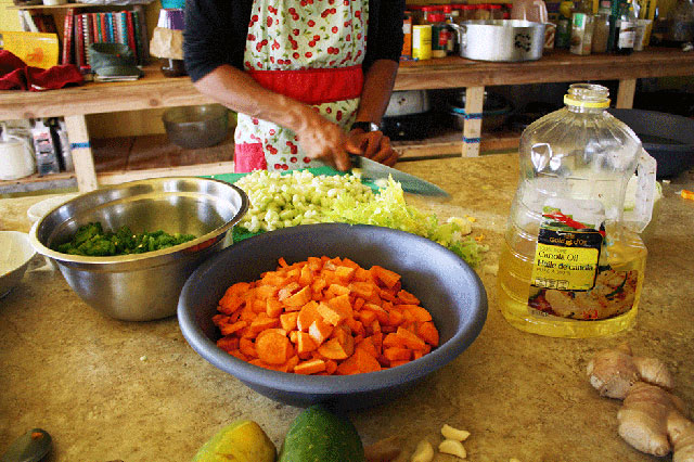 Volunteers use food from the garden to prepare meals for everyone. Nothing is wasted.