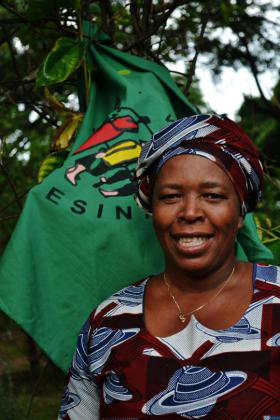 Elizabeth Mpofu with the banner for La Via Campesina. (Photo: Elizabeth Mpofu)