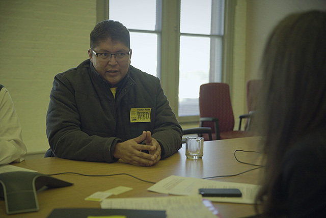 Tommy Rock, of Diné No Nukes, meets with staff of the USDA, January, 2016. (Photo: Klee Benally)