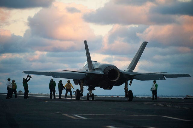 An F-35C Lightning II is prepared to launch from the deck of USS Dwight D. Eisenhower during the second developmental test phase of the next-generation strike fighter. The F-35 program has suffered countless ills since 2001 and the total projected program cost stands at more than $1 trillion.