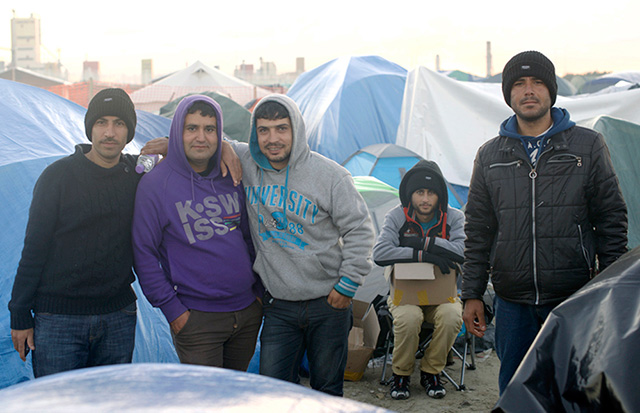 Salah (center) with friends from Rojava. (Photo: Peter Blodau)