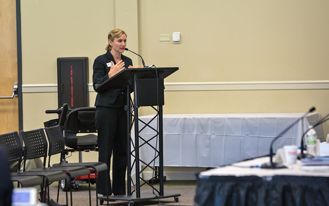 Jennifer Hecker speaking against SB 318 and HB 181 to the Collier County legislative delegation on October 15 in Naples. (Julie Dermansky)