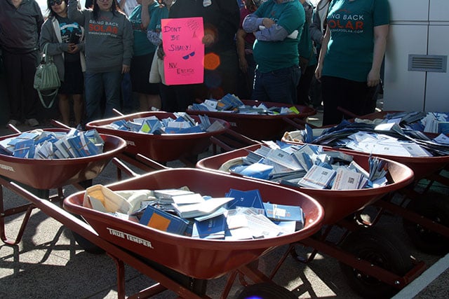 Wheelbarrows full of 55,000 solar support postcards delivered to the Nevada Public Utilities Commission on February 12, 2016. (Photo: Sam Lopaze)