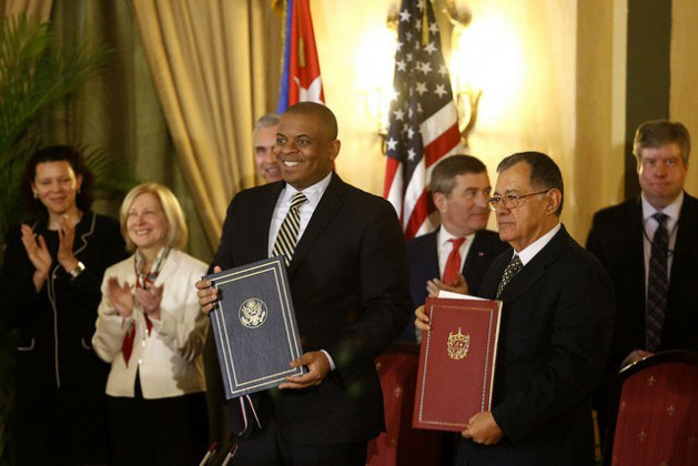 U.S. Secretary of Transportation Anthony Foxx (left) and his Cuban counterpart Adel Izquierdo signed an agreement Feb. 16 in Havana to restore commercial flights between the two countries. In the last year, four U.S. cabinet secretaries have visited Cuba. (Photo: Jorge Luis Baños / IPS)