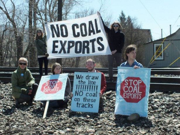 Activists protesting on the train tracks in April 2014.
