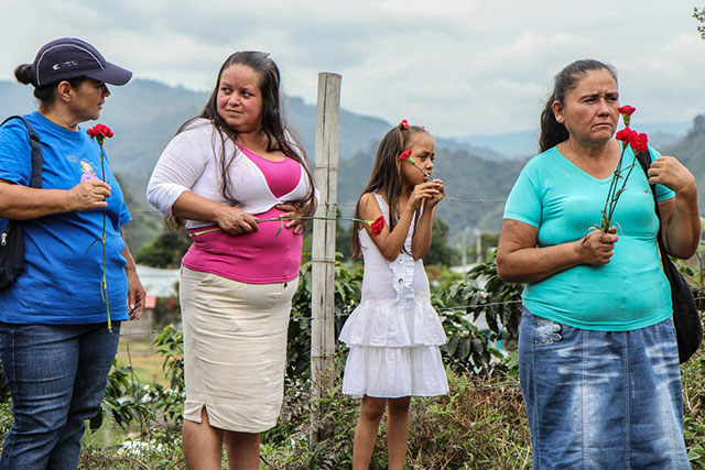 Residents in Trujillo prepare for a march to commemorate the more than 300 people who were massacred in their community during a few bloody ears in Colombia's armed conflict. (Photo: Andalusia Knoll)