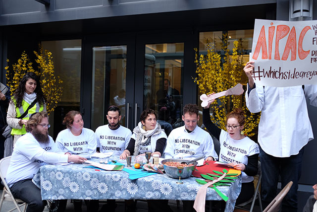 IfNotNow holds a ritual seder outside AIPAC with a hundred people in attendance. (Photo: Sam Boaz)