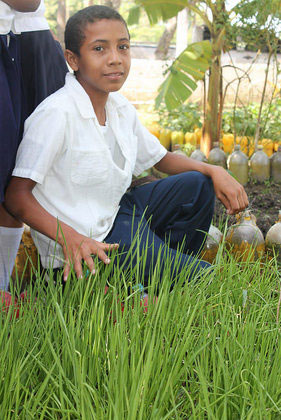 Josué Orlando Torres, an 11-year-old student, dreams of becoming a farmer to ensure that children like himself have access to free high-quality food at this school in the indigenous community of Coloaca, where a sustainable school programme is beginning to overcome chronic malnutrition. (Credit: Thelma Mejía/IPS)