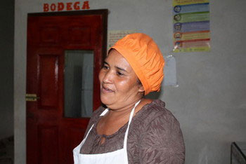 Rubenia Cortes, a mother and volunteer cook at the school in the remote village of La Cañada in the department (province) of Lempira, in western Honduras. They cook in a kitchen that was built by parents and teachers at the school. (Credit: Courtesy of Thelma Mejía)