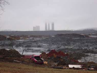 In the days and weeks following the TVA disaster, coal ash coated nearly 400 acres of rural landscape in Kingston, Tenn., in gray muck. Workers remember being immersed in the slurry up to their knees. (Photo courtesy of Ansol Clark)