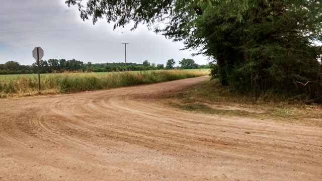 The stop sign at Vreeland and Harris, two narrow dirt roads with very little traffic. (Photo courtesy of Jacquelyn Miller)