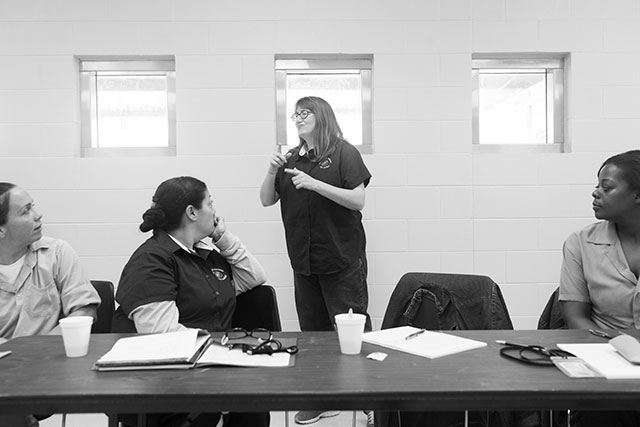 3. Students practice American Sign Language during a class at a prison near Baton Rouge. Some go on to interpret for deaf prisoners, a practice that advocates say is problematic but better than nothing. (Photo: Annie Flanagan)