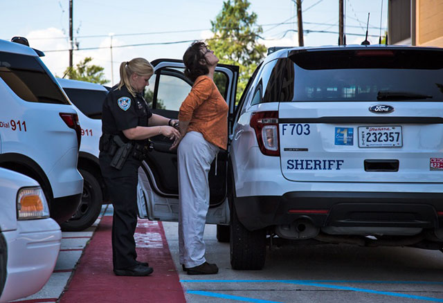 Louisiana activist Sue Prevost being taken away by police for trespassing. (Photo: Julie Dermansky)