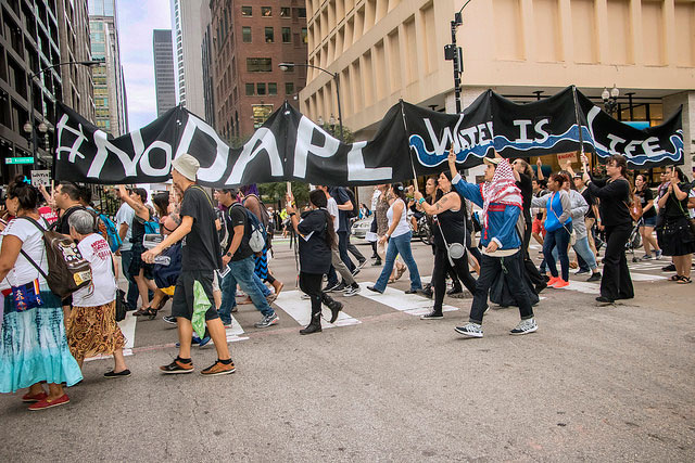 Chicagoans rallied in front of City Hall and then marched through the downtown to protest the Dakota Access pipeline, September 9, 2016. Virtually every name in the financial pantheon has extended credit in some form to the Dakota pipeline project. Sustained public pressure could help derail those loans.