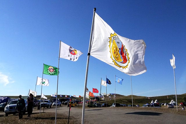 Flags at Oceti Sakowin camp, on September 14, 2016 (Sarah Jaffe for BillMoyers.com)